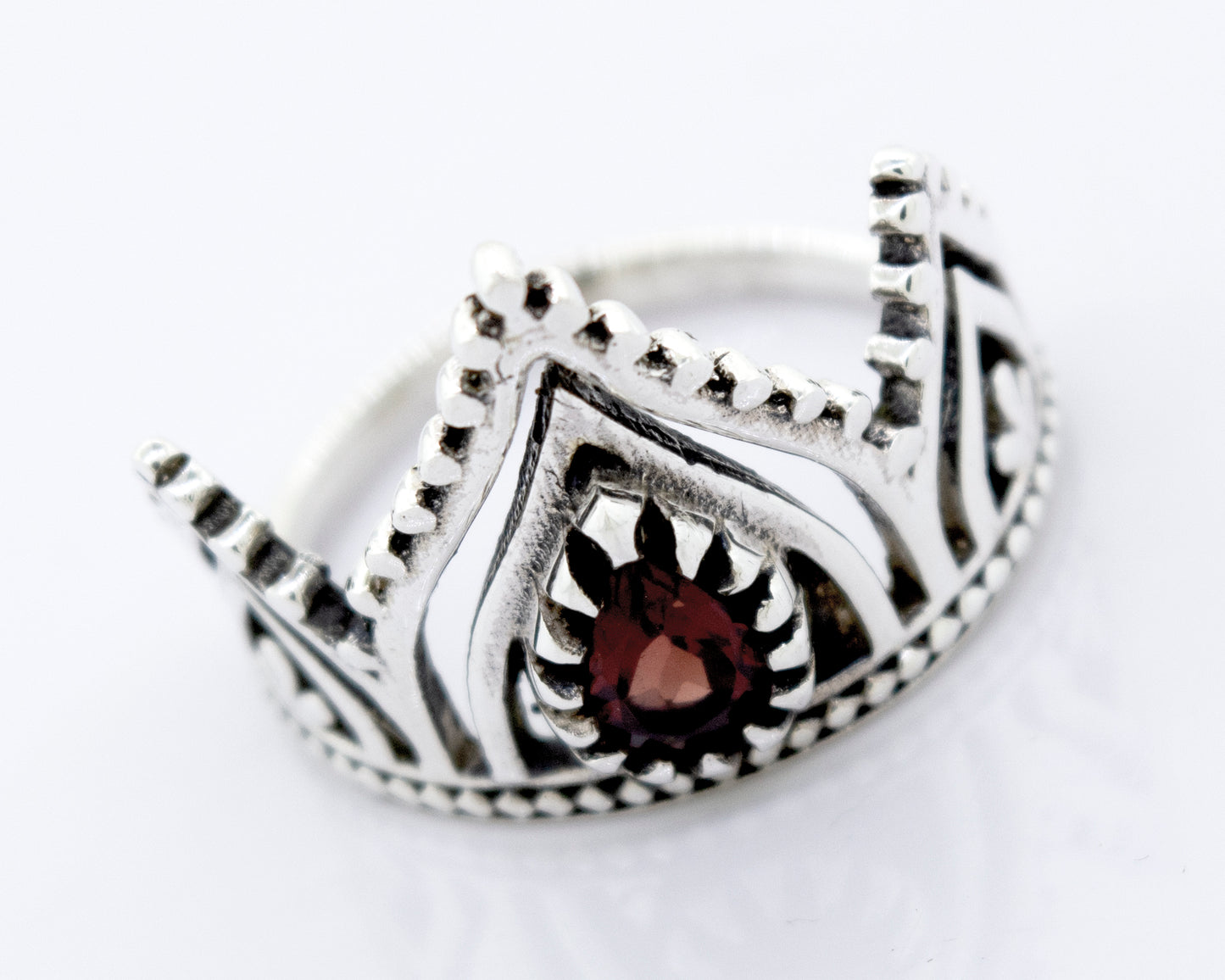 
                  
                    A Super Silver Crown Ring with Teardrop Shape Garnet.
                  
                