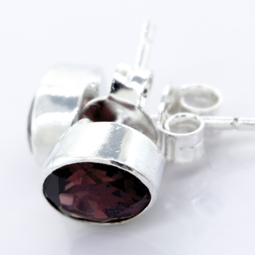 A pair of Garnet Studs With Plain Sterling Silver Setting from Super Silver.
