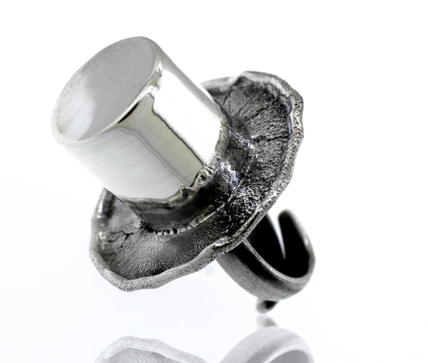 An Artisans Top Hat Ring on a white background.