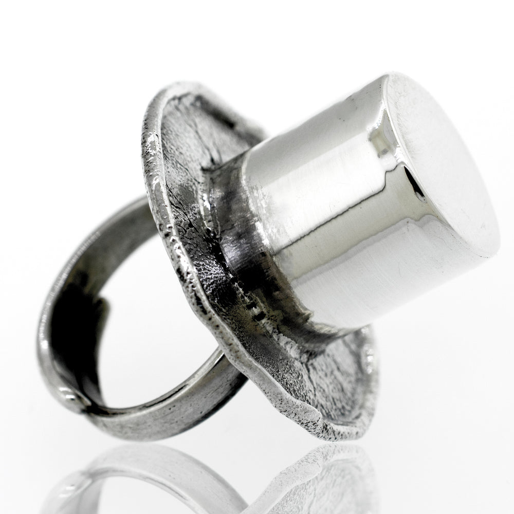 A minimalist Artisans Top Hat adjustable ring. 