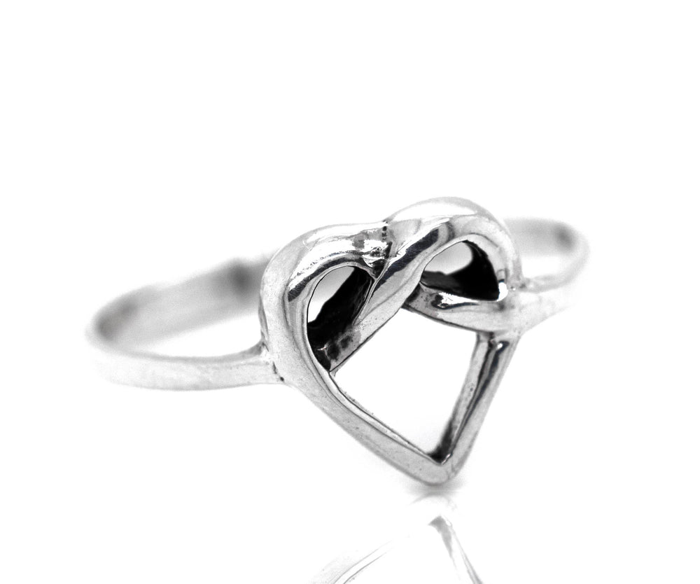 A minimalist Entwined Heart Knot Ring, symbolizing love.