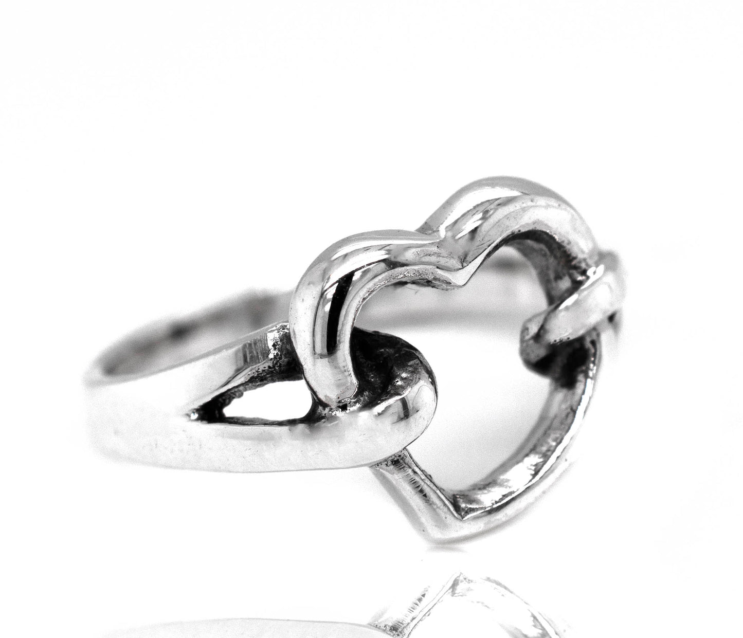 
                  
                    An Open Heart Double Knot Ring on a white background.
                  
                