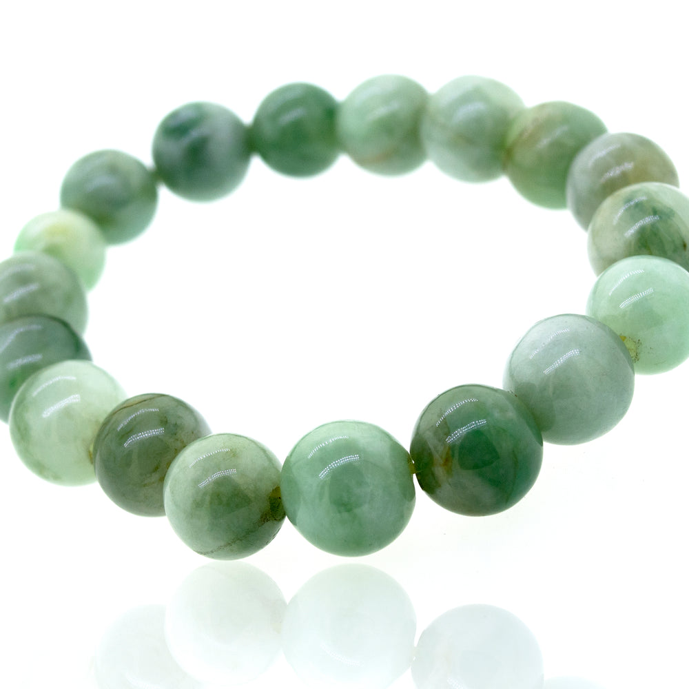 An Elegant Jade Beaded Bracelet by Super Silver on a white background.