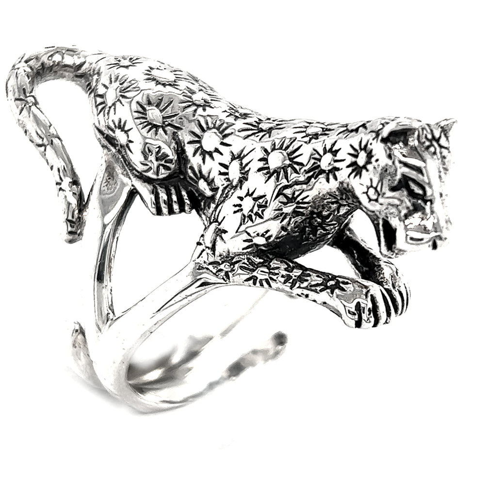 A Super Silver Statement Jaguar Ring with a leopard on it.