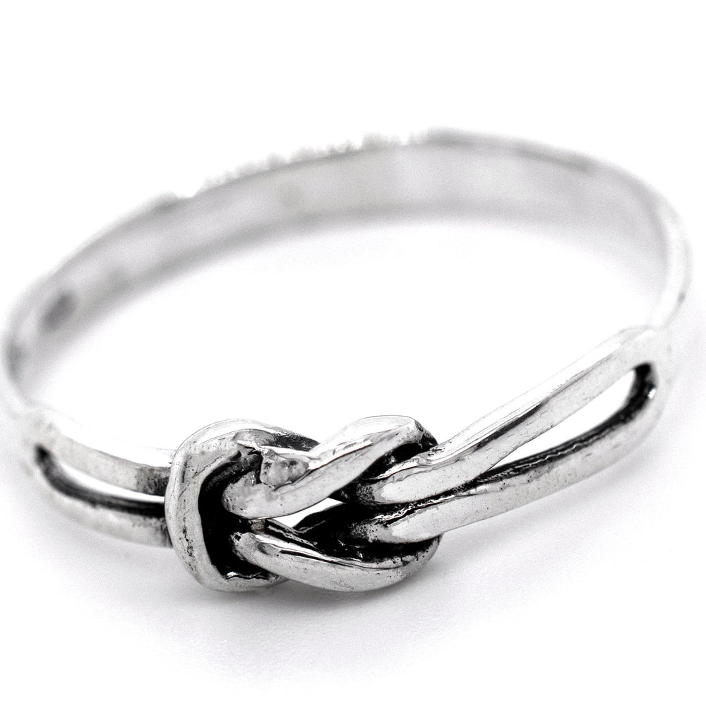 A minimalist Slender Square Knot Ring with a knot design.