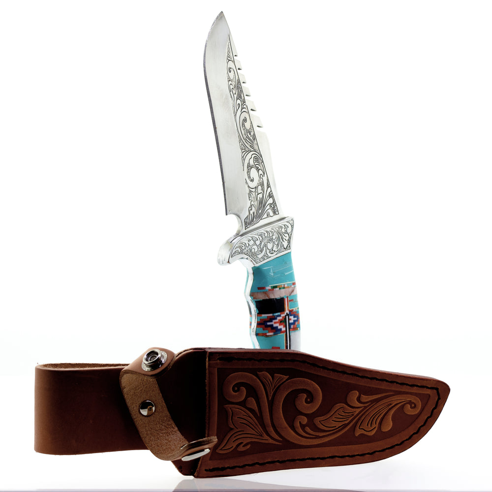 A Stunning Handcrafted Knife With Inlaid Stone Handle on a white background.