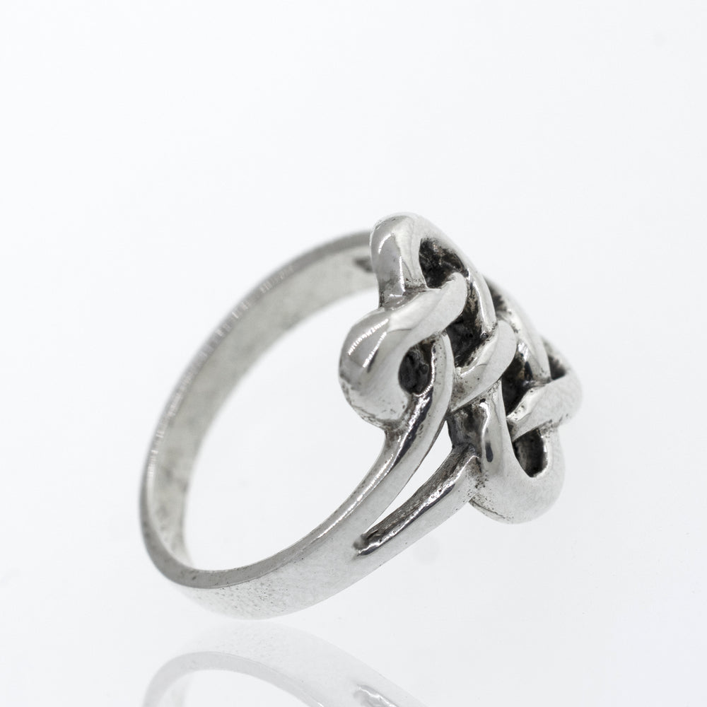 
                  
                    A Celtic Knot Design Ring with a knot in the middle.
                  
                