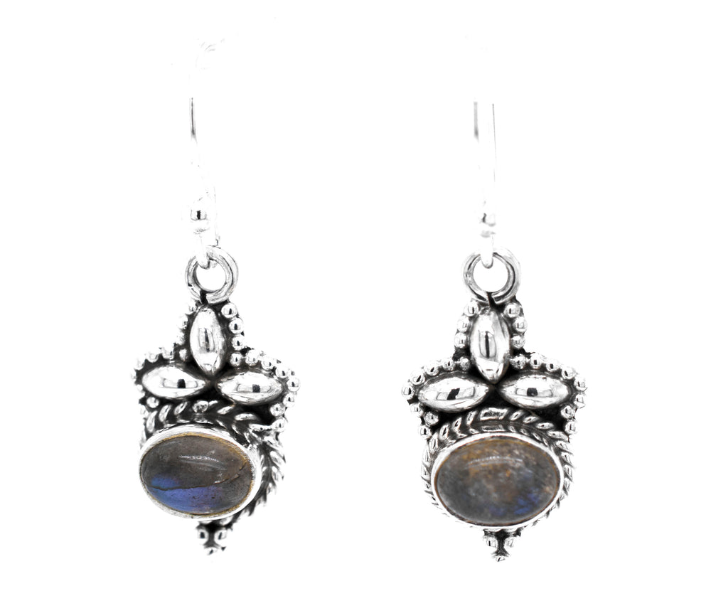 A pair of Captivating Petite Stone Earrings by Super Silver with labradorite gemstone stones.