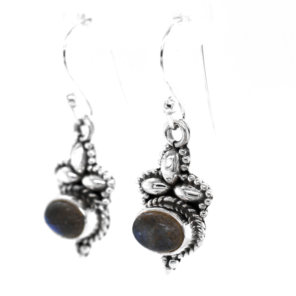 
                  
                    A pair of Super Silver Captivating Petite Stone Earrings with a labradorite gemstone.
                  
                