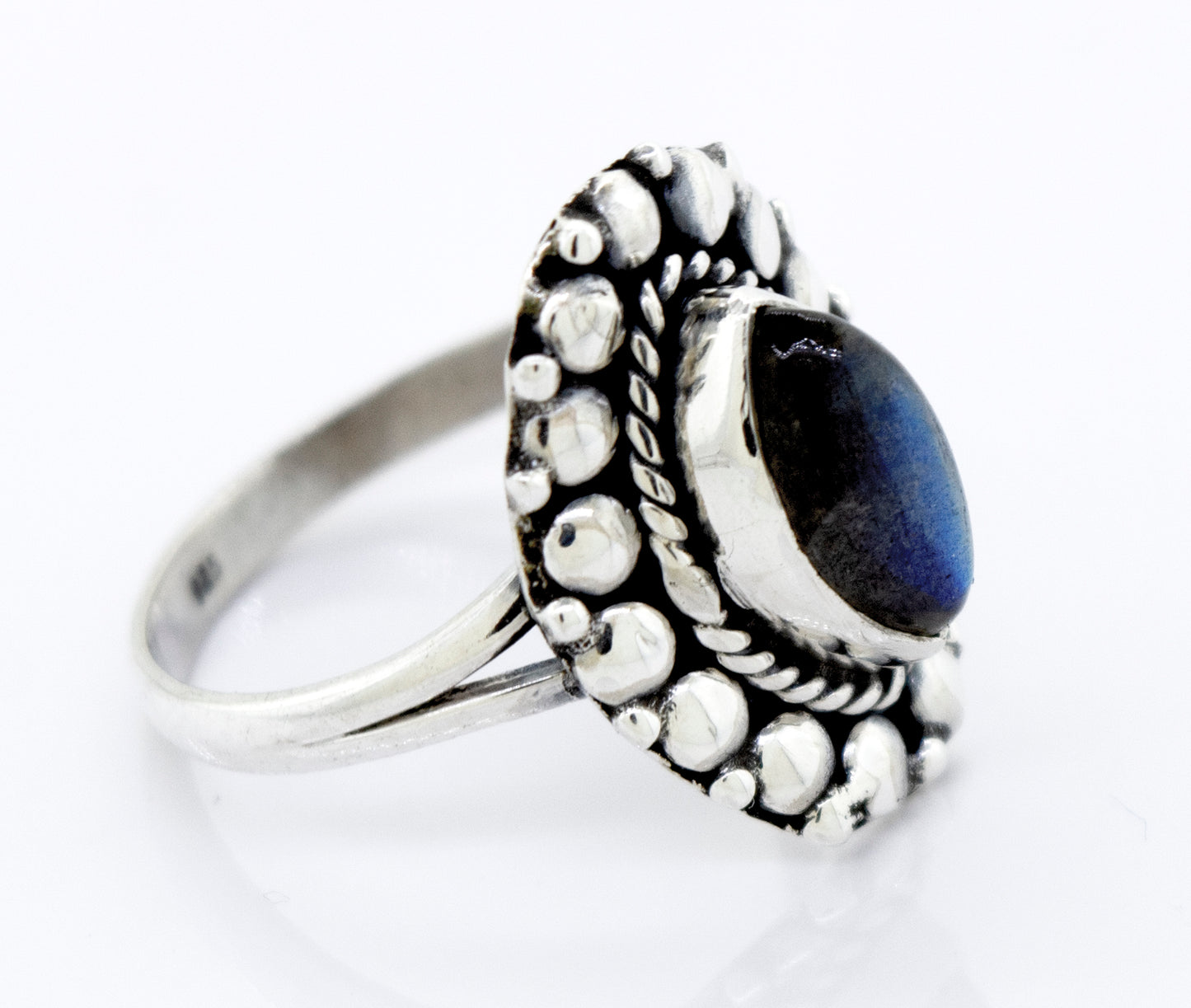 
                  
                    A mesmerizing silver ring featuring the Marquise Shaped Vibrant Labradorite Stone Ring by Super Silver.
                  
                
