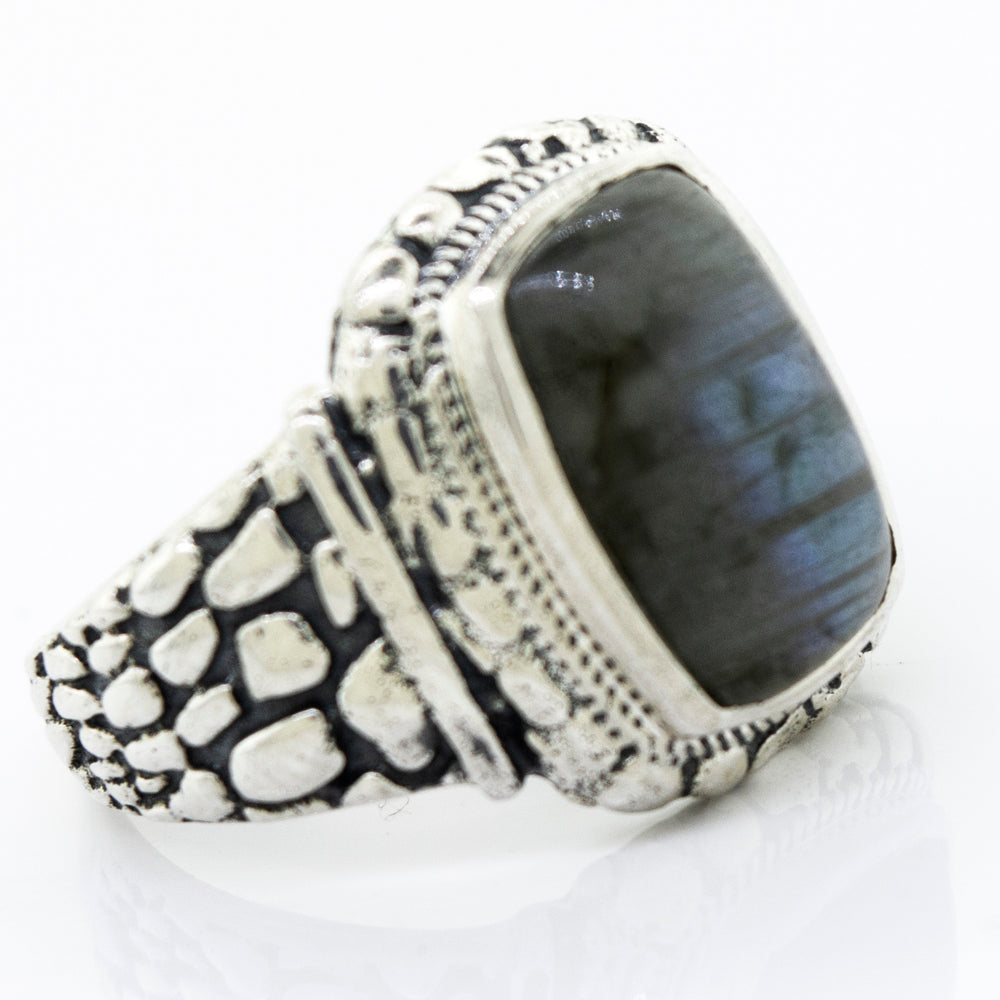 A sterling silver men's Labradorite Signet Ring With Dragon Scale Pattern.