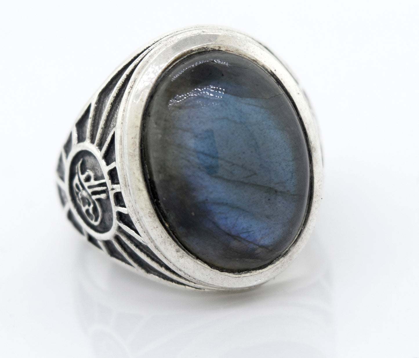 A statement sterling silver Labradorite Oval Signet Ring With Wolf Symbol.