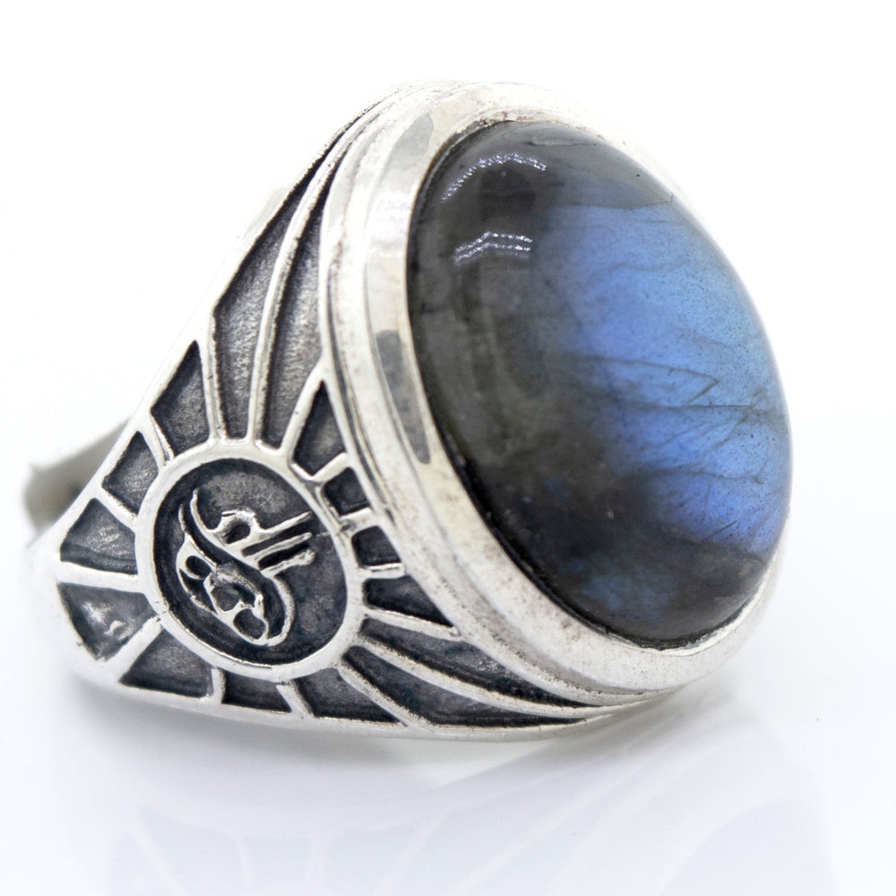 A minimalist sterling silver Labradorite Oval Signet Ring With Wolf Symbol.