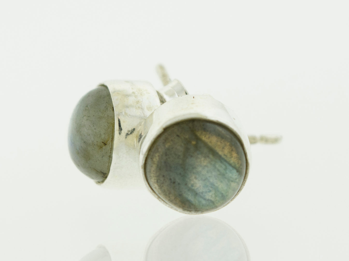 A pair of Simple Circle Labradorite stud earrings by Super Silver on a white surface, perfect for every day wear.