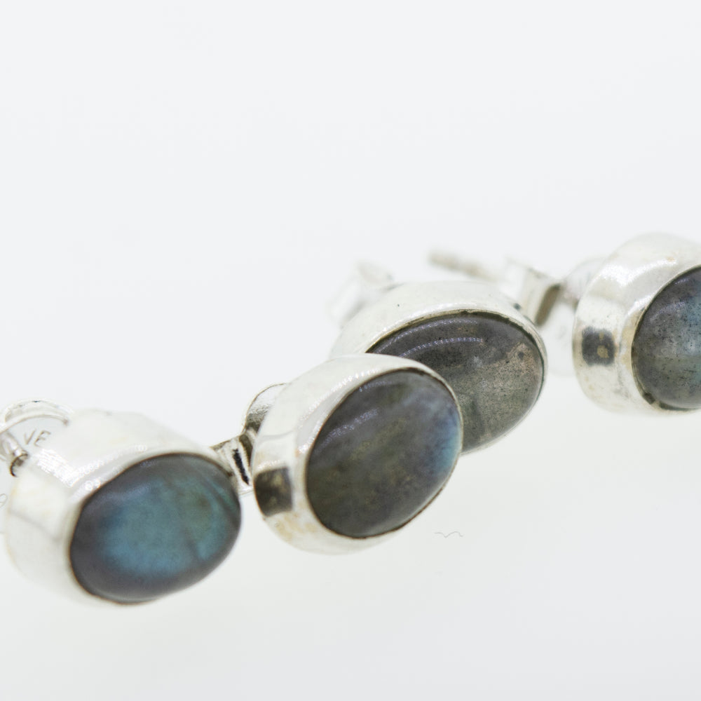 These beautiful Super Silver Simple Oval Labradorite Studs will shine at any occasion.