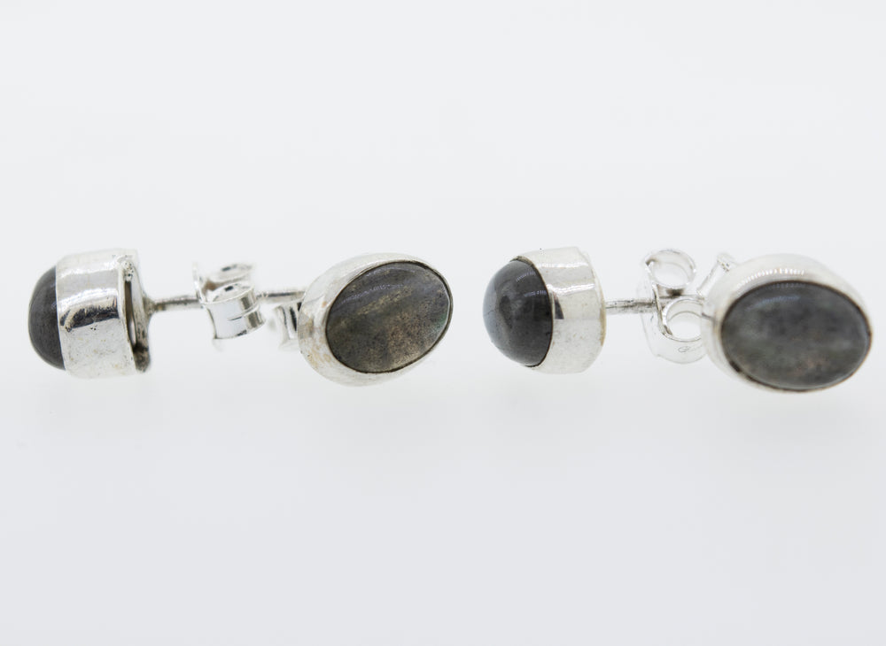 
                  
                    These beautiful Simple Oval Labradorite Studs in sterling silver from Super Silver shine on any occasion.
                  
                