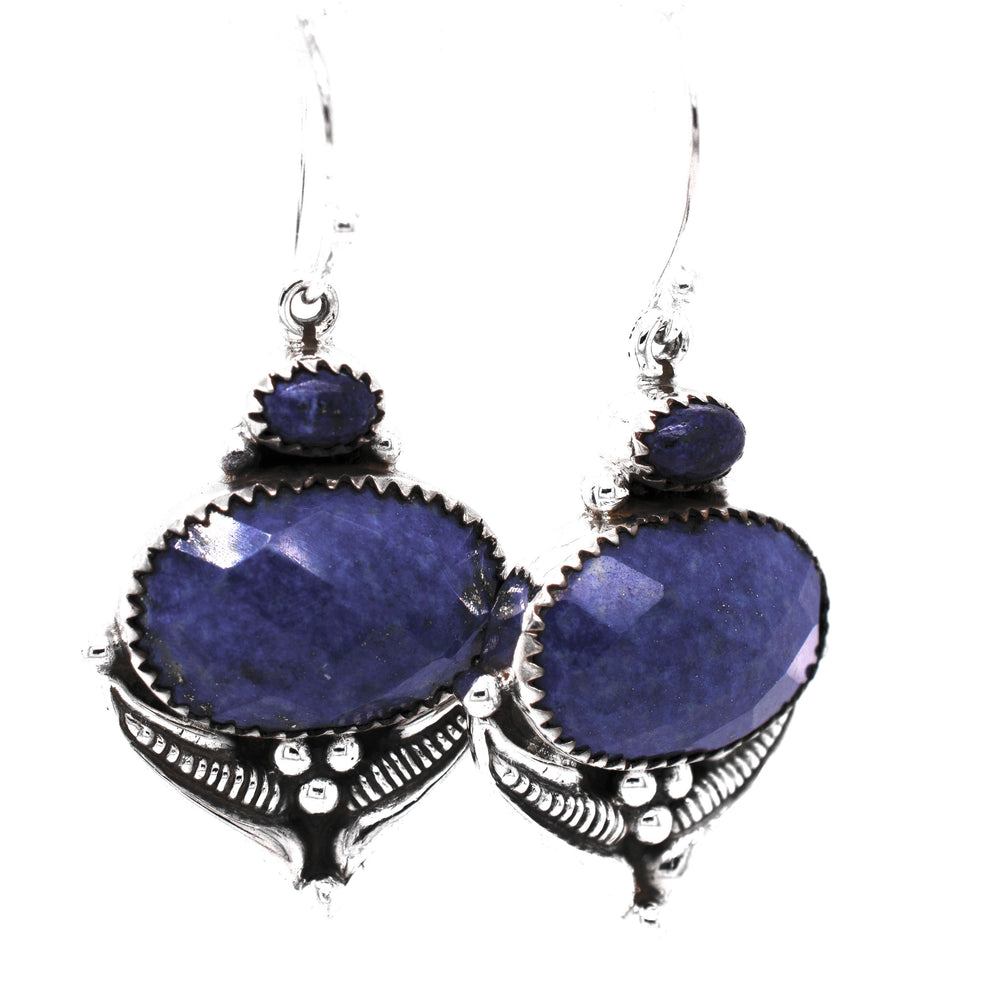 
                  
                    A pair of Spectacular Faceted Gemstone Earrings by Super Silver, featuring lapis faceted stones.
                  
                