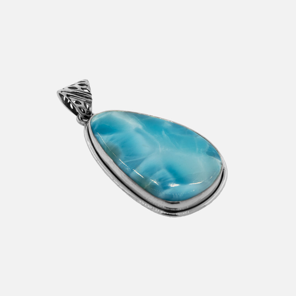 A stunning Super Silver Larimar Pendant featuring a beautiful blue stone.
