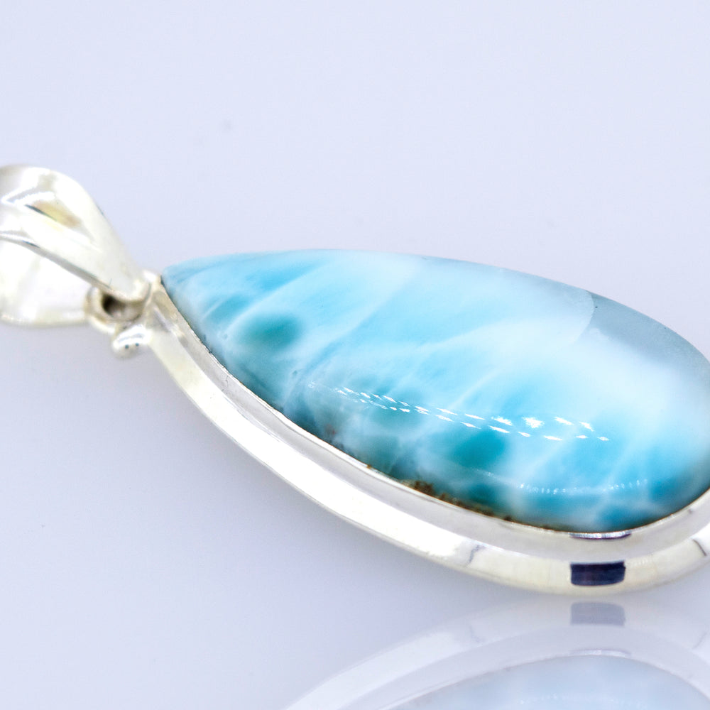 A striking Medium Teardrop Larimar pendant on a sterling silver chain guaranteed to make you stand out on any occasion, by Super Silver.