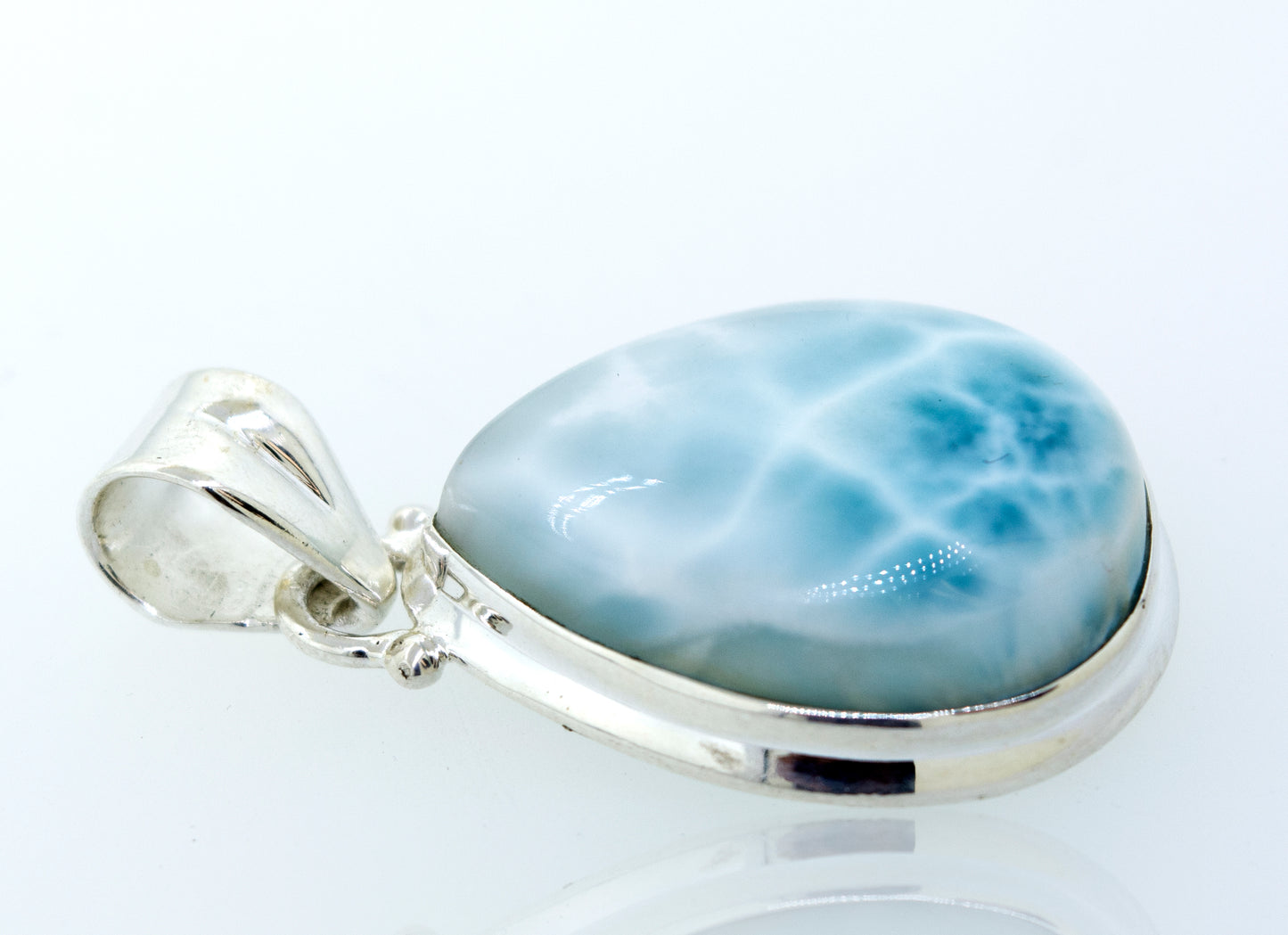 A stunning piece, this simple Super Silver Smaller Teardrop Larimar Pendant is perfect for a night out.