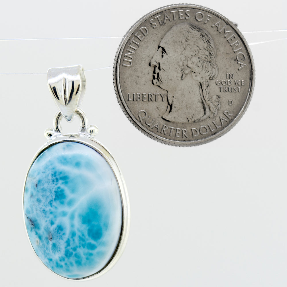 
                  
                    A stunning Super Silver pendant featuring a gorgeous Smaller Oval Larimar stone, perfect for everyday wear.
                  
                