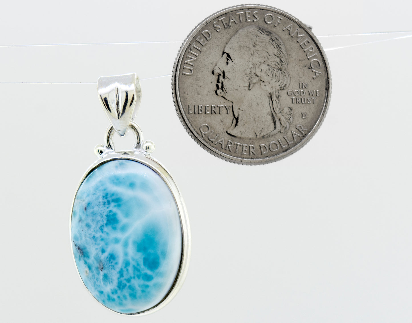 
                  
                    A stunning Super Silver pendant featuring a gorgeous Smaller Oval Larimar stone, perfect for everyday wear.
                  
                