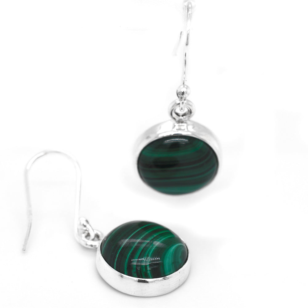 
                  
                    A pair of Super Silver Gorgeous Round Malachite Earrings featuring a mesmerizing green malachite stone known for its healing properties.
                  
                