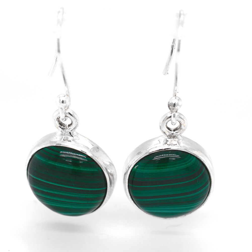 A pair of Super Silver Gorgeous Round Malachite Earrings, known for their healing properties, adorned with beautiful green malachite.