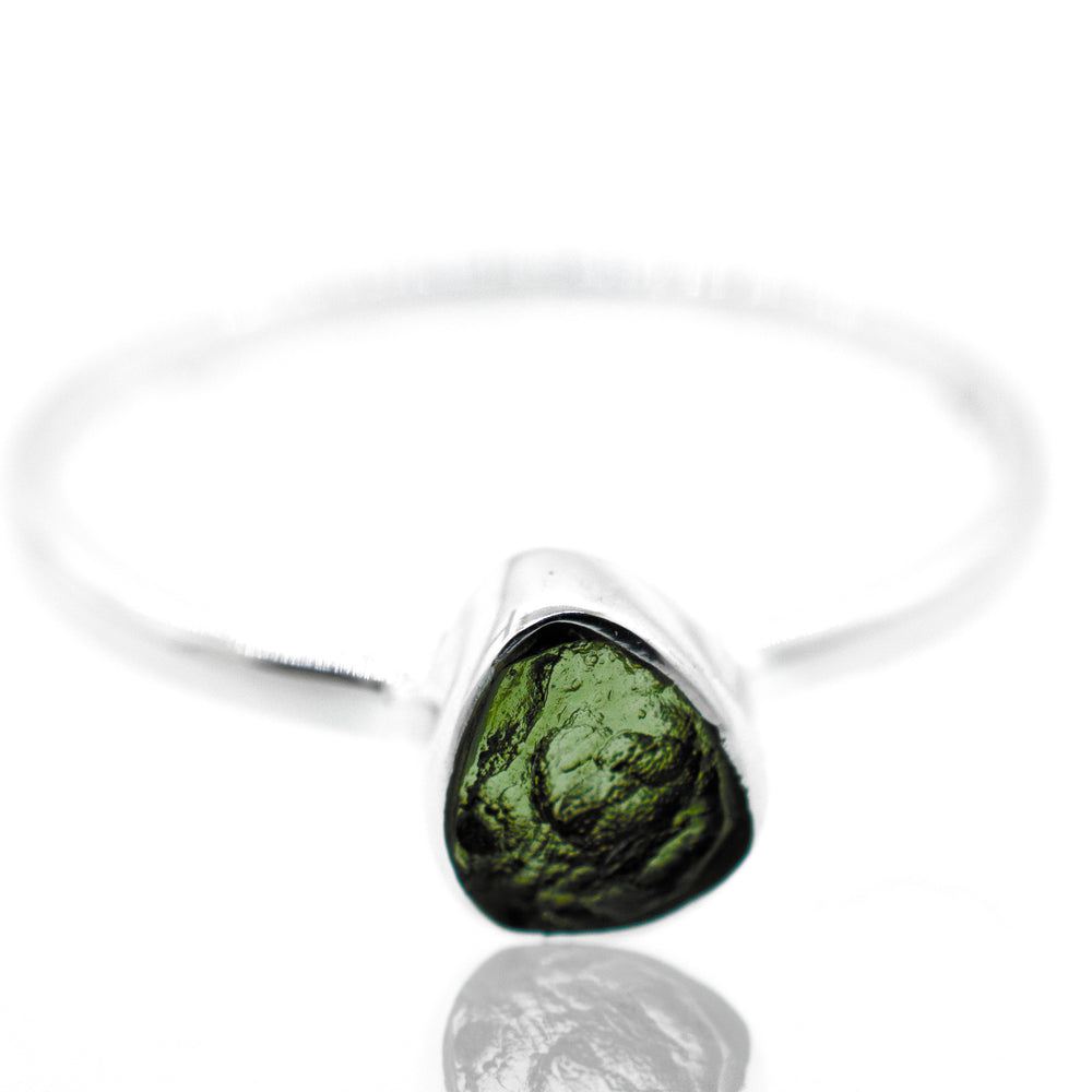 
                  
                    A Super Silver raw moldavite ring set in a sterling silver setting.
                  
                