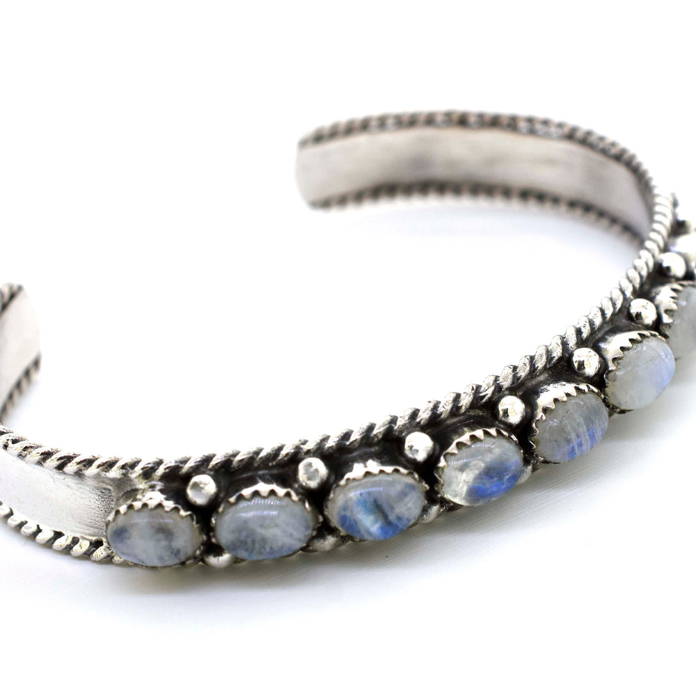 
                  
                    A Super Silver Oval Moonstone Cuff Bracelet adorned with dazzling moonstone accents.
                  
                