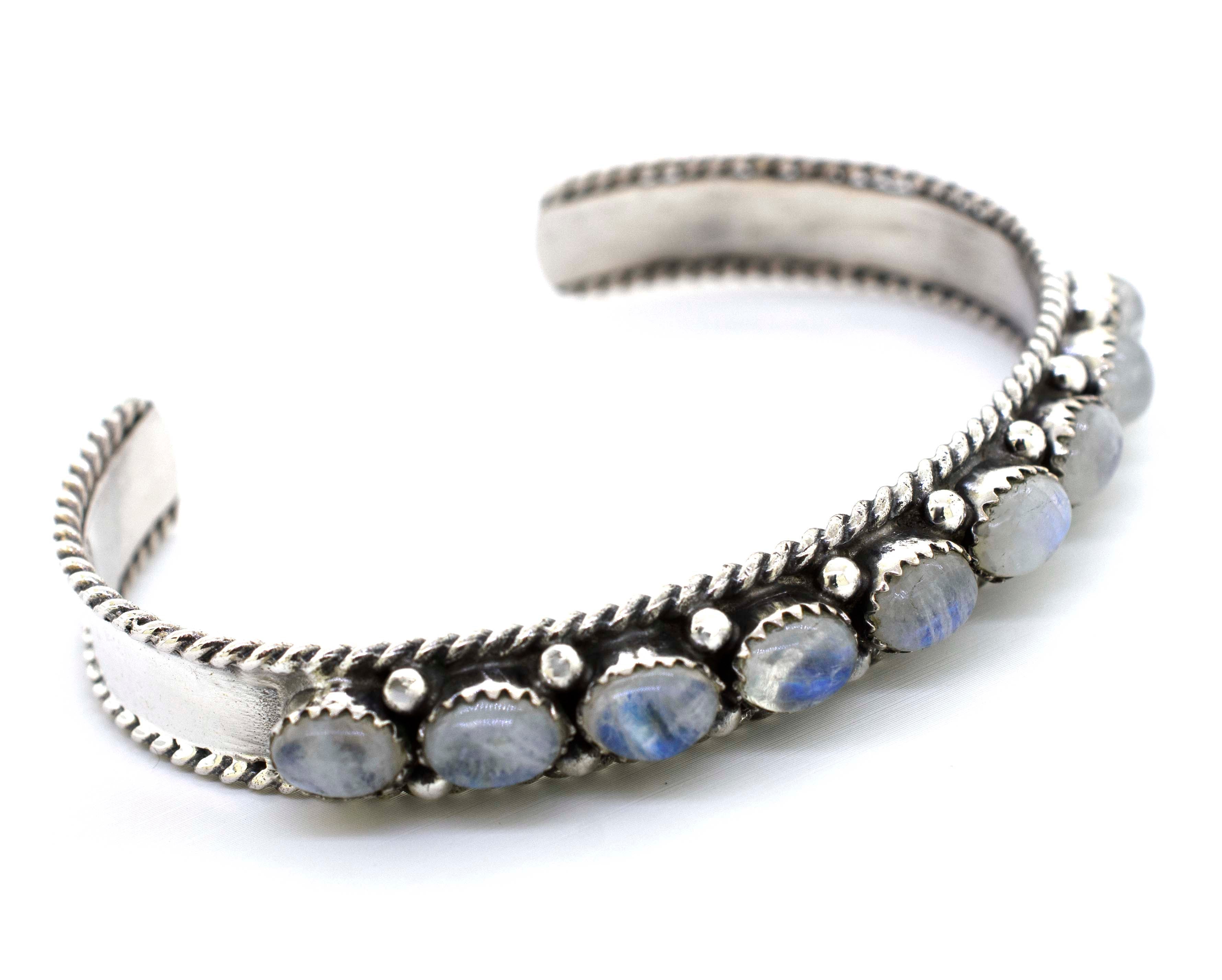 A Super Silver Oval Moonstone Cuff Bracelet adorned with dazzling moonstone accents.