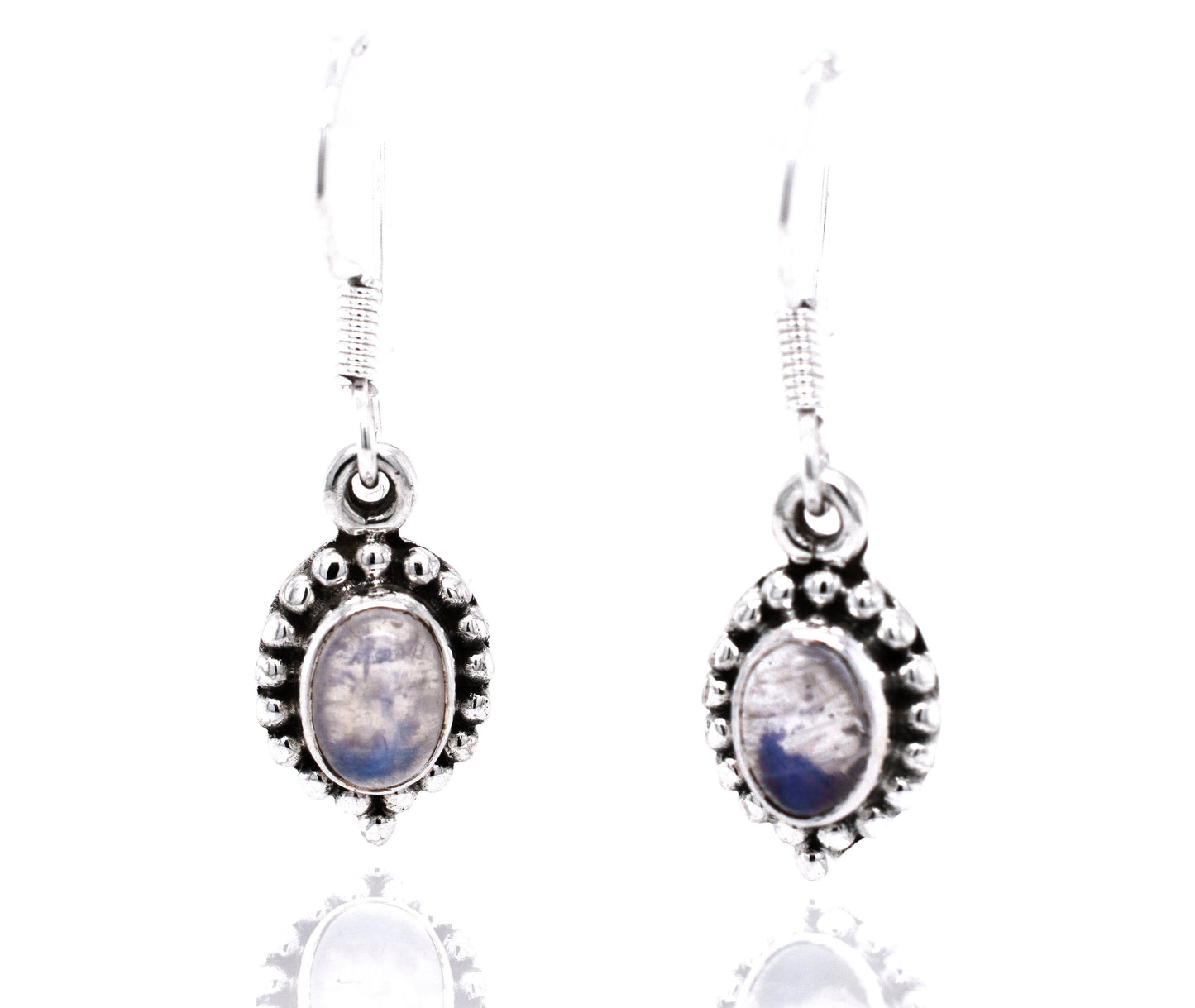 
                  
                    A pair of Dainty Moonstone Earrings with Beaded Border by Super Silver, exuding boho charm.
                  
                