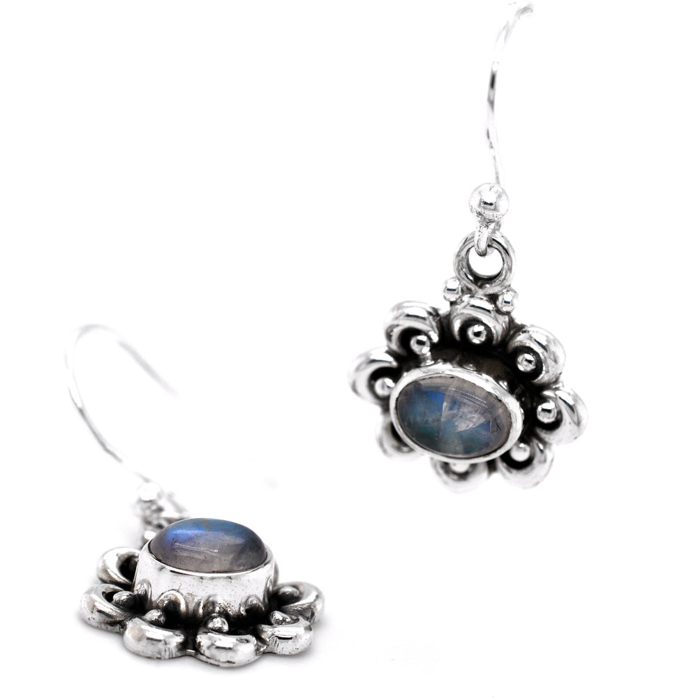 
                  
                    A pair of Darling Floral Moonstone Earrings by Super Silver, perfect for nature-inspired jewelry enthusiasts.
                  
                
