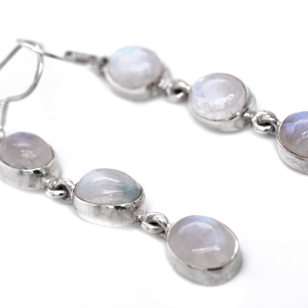
                  
                    Super Silver's Radiant Long Earrings with Three Moonstones.
                  
                