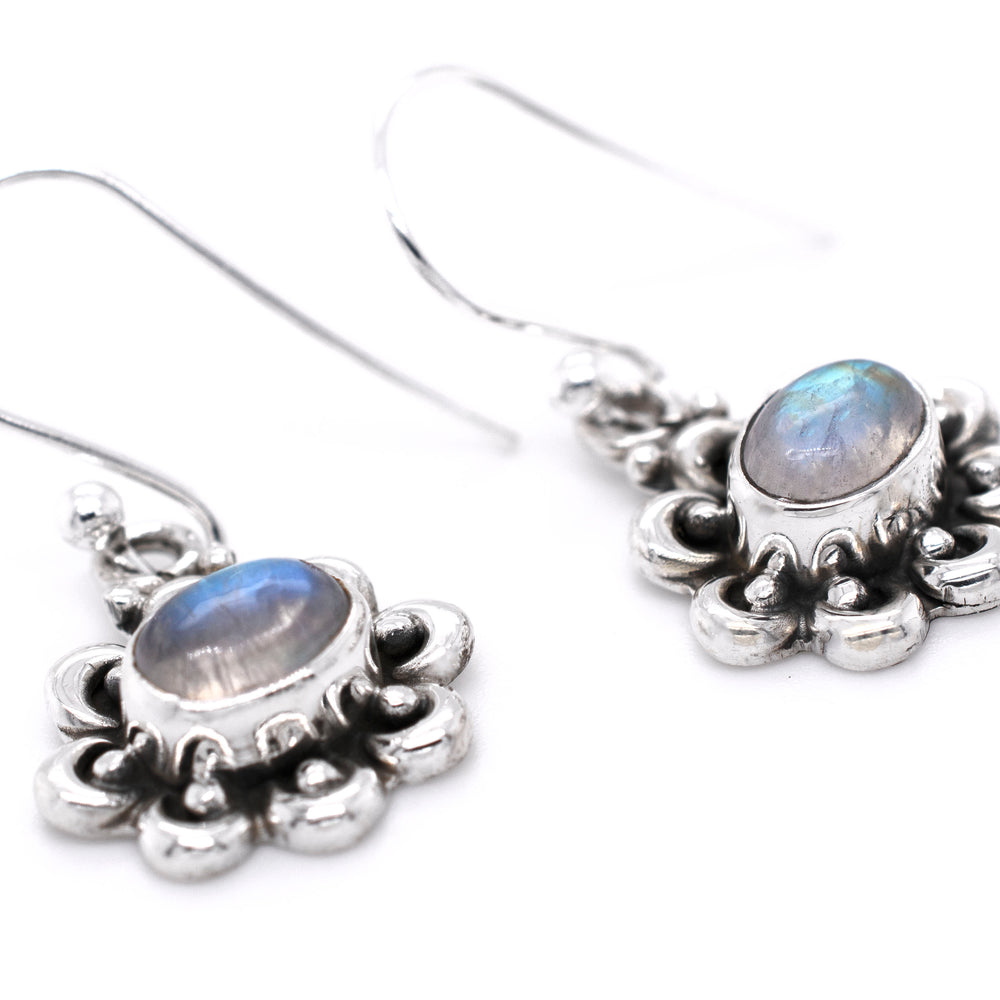 
                  
                    These Darling Floral Moonstone Earrings from Super Silver feature a captivating blue moonstone set in sterling silver.
                  
                