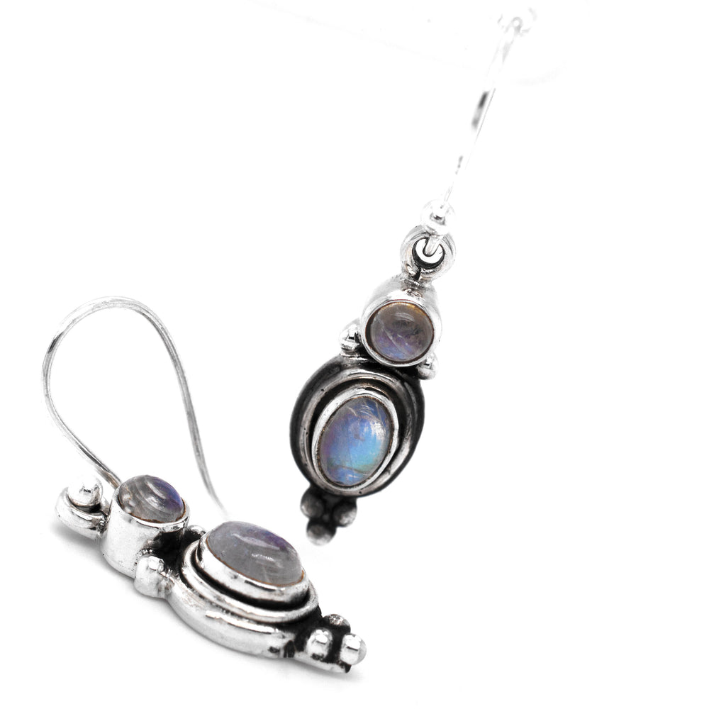 
                  
                    A pair of Super Silver Goddess Shape Gemstone Earrings with blue moonstones. These elegant stone earrings are adorned with beautiful blue moonstones, creating a captivating and enchanting look.
                  
                