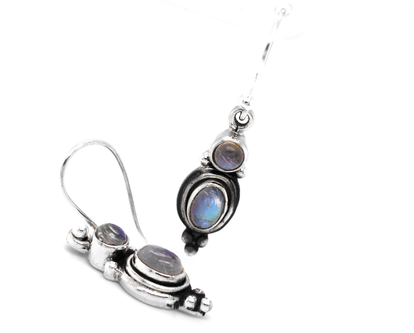 
                  
                    A pair of Super Silver Goddess Shape Gemstone Earrings with blue moonstones. These elegant stone earrings are adorned with beautiful blue moonstones, creating a captivating and enchanting look.
                  
                
