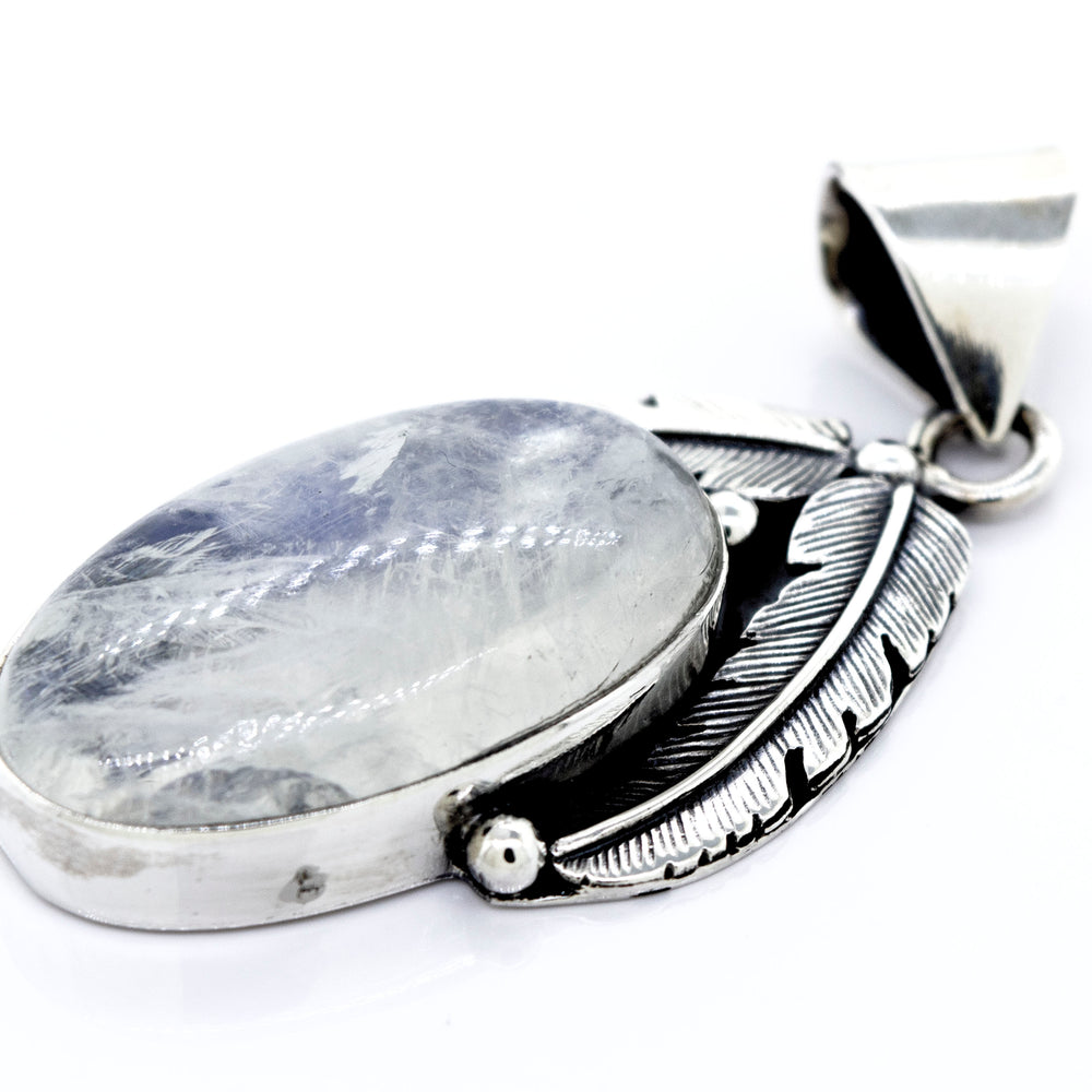 A Moonstone Pendant with Feathers adorned with feathers from Super Silver.