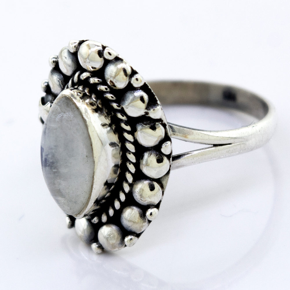 A Marquise Shaped Vibrant Moonstone Ring from Super Silver with a beaded design.