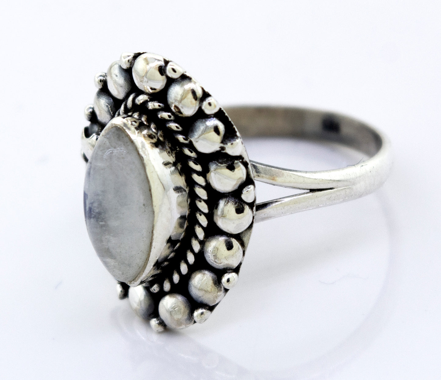 
                  
                    A Marquise Shaped Vibrant Moonstone Ring from Super Silver with a beaded design.
                  
                