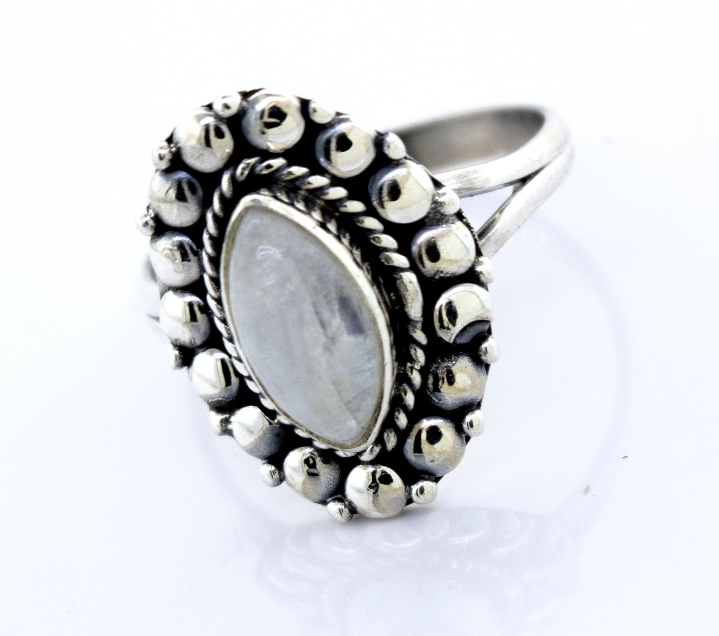 
                  
                    A Marquise Shaped Vibrant Moonstone Ring from Super Silver, with a beaded design in the center.
                  
                
