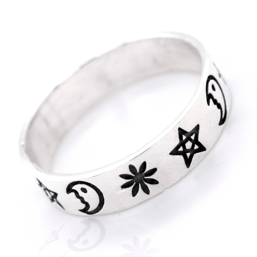 This Super Silver sterling silver band features an etched crescent moon and stars shape design.