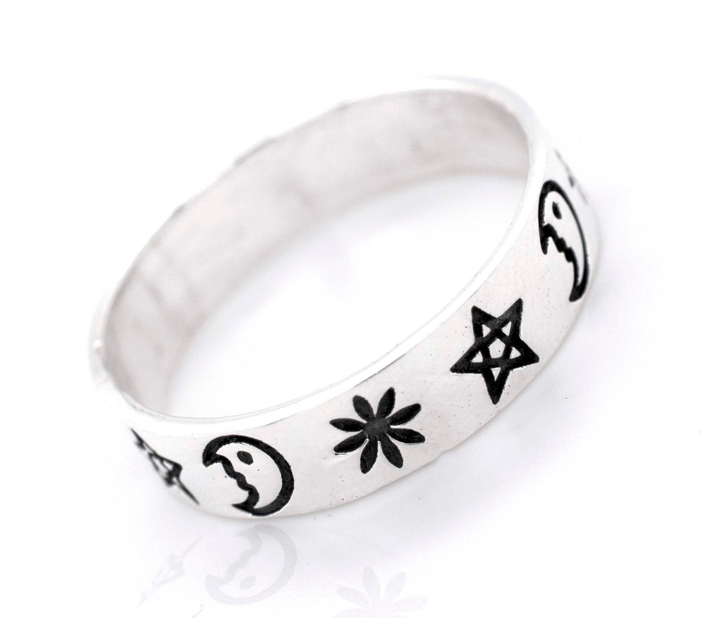 This Super Silver sterling silver band features an etched crescent moon and stars shape design.