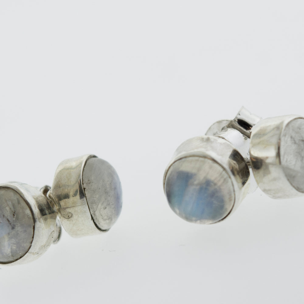 
                  
                    These Simple Circle Moonstone Studs by Super Silver, with a blue stone, are perfect for every day wear.
                  
                
