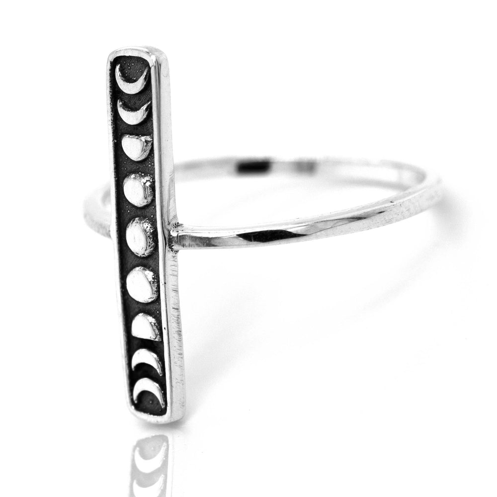 
                  
                    A minimalist Elongated Moon Phases ring.
                  
                