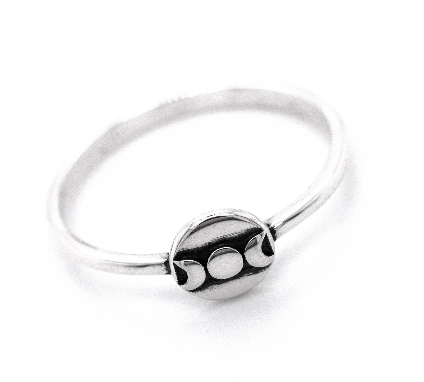 
                  
                    A Dainty Moon Phases Ring with a white ball on it made by Super Silver.
                  
                