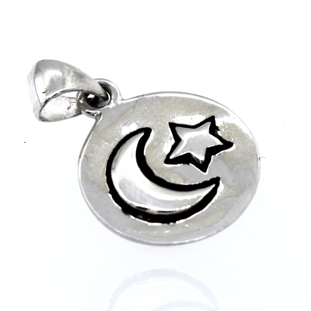 
                  
                    A Super Silver Moon And Star Pendant with a crescent and star on it.
                  
                