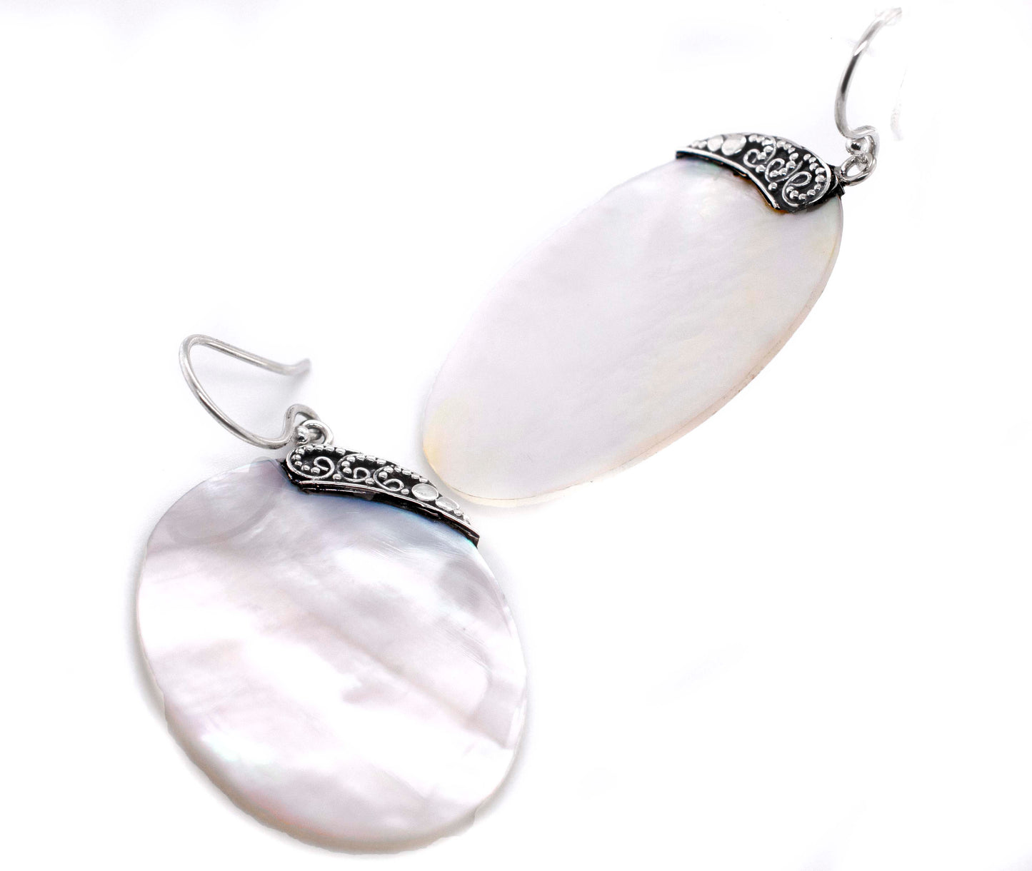 
                  
                    Simple Mother Of Pearl Statement Earrings
                  
                