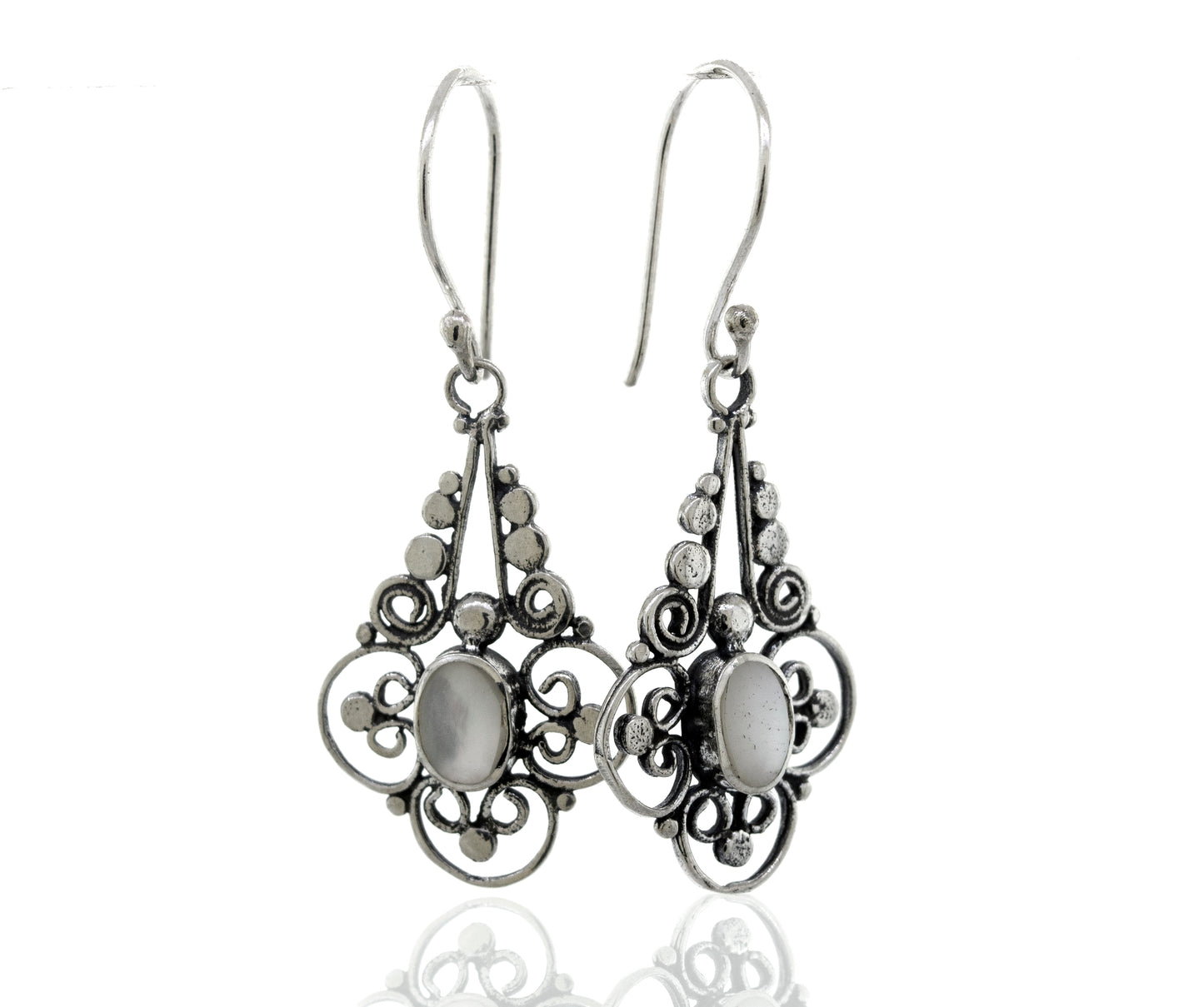 
                  
                    A pair of Super Silver Oval Mother Of Pearl Dangle Earrings With A Flower Design.
                  
                