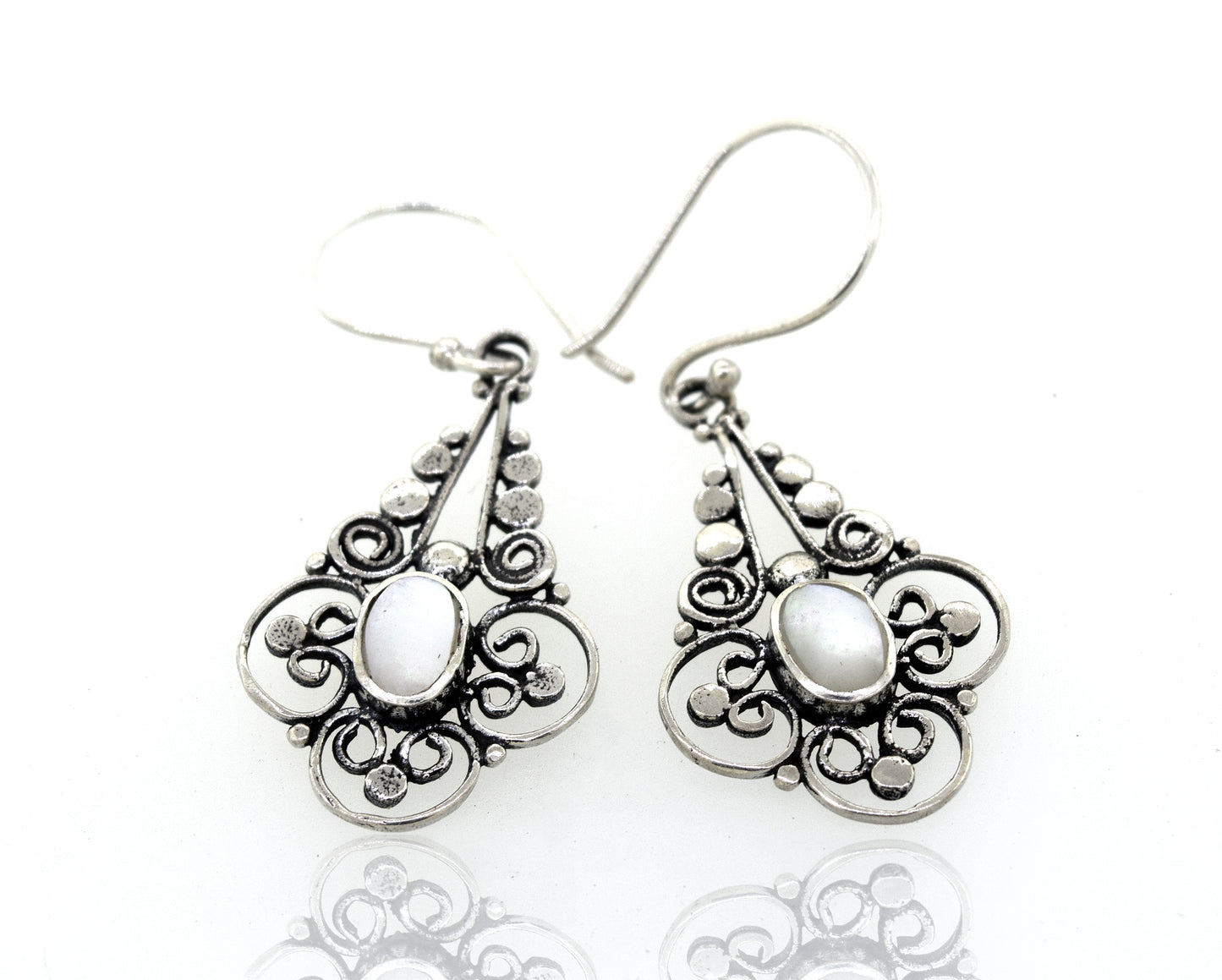 
                  
                    A pair of Oval Mother Of Pearl Dangle Earrings with a flower design from Super Silver.
                  
                